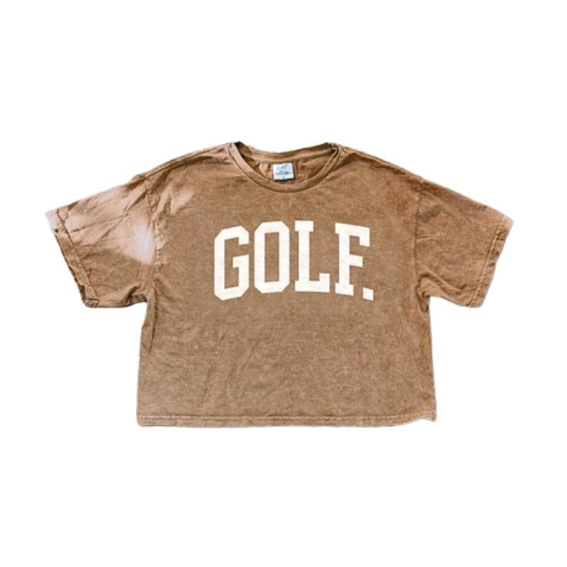 A tan mineral washed cropped short sleeve tee with bold white GOLF lettering, displayed on a flat white background.