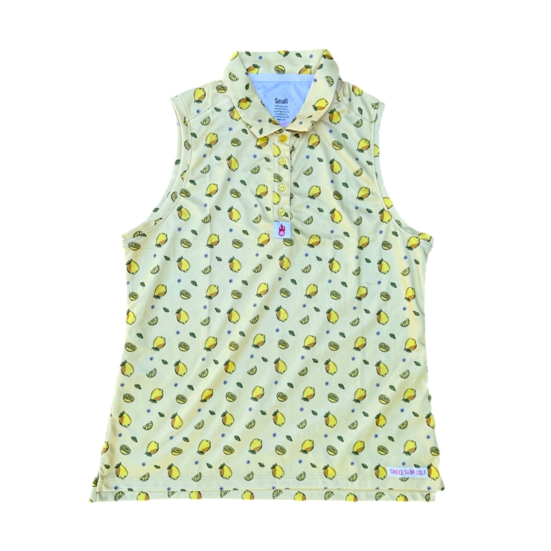 A lemon print sleeveless women’s golf polo displayed on a white background.