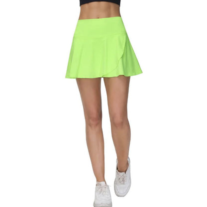 Person wearing a bright green skirt on a white background