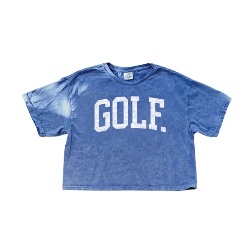 A blue mineral washed cropped short sleeve shirt with GOLF text on a white background. 