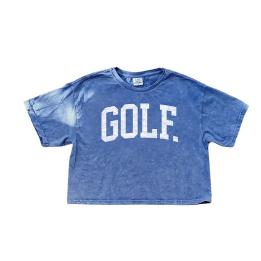 A blue mineral washed cropped short sleeve shirt with GOLF text on a white background. 